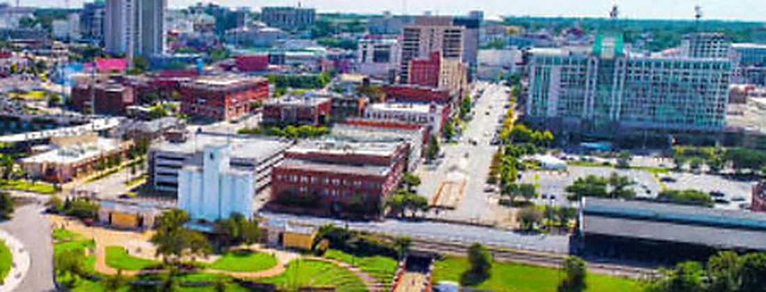 The RSA Tower above downtown Montgomery and the Alabama River