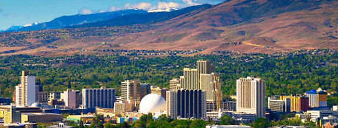 Reno in the Truckee Meadows below snow-streaked ranges